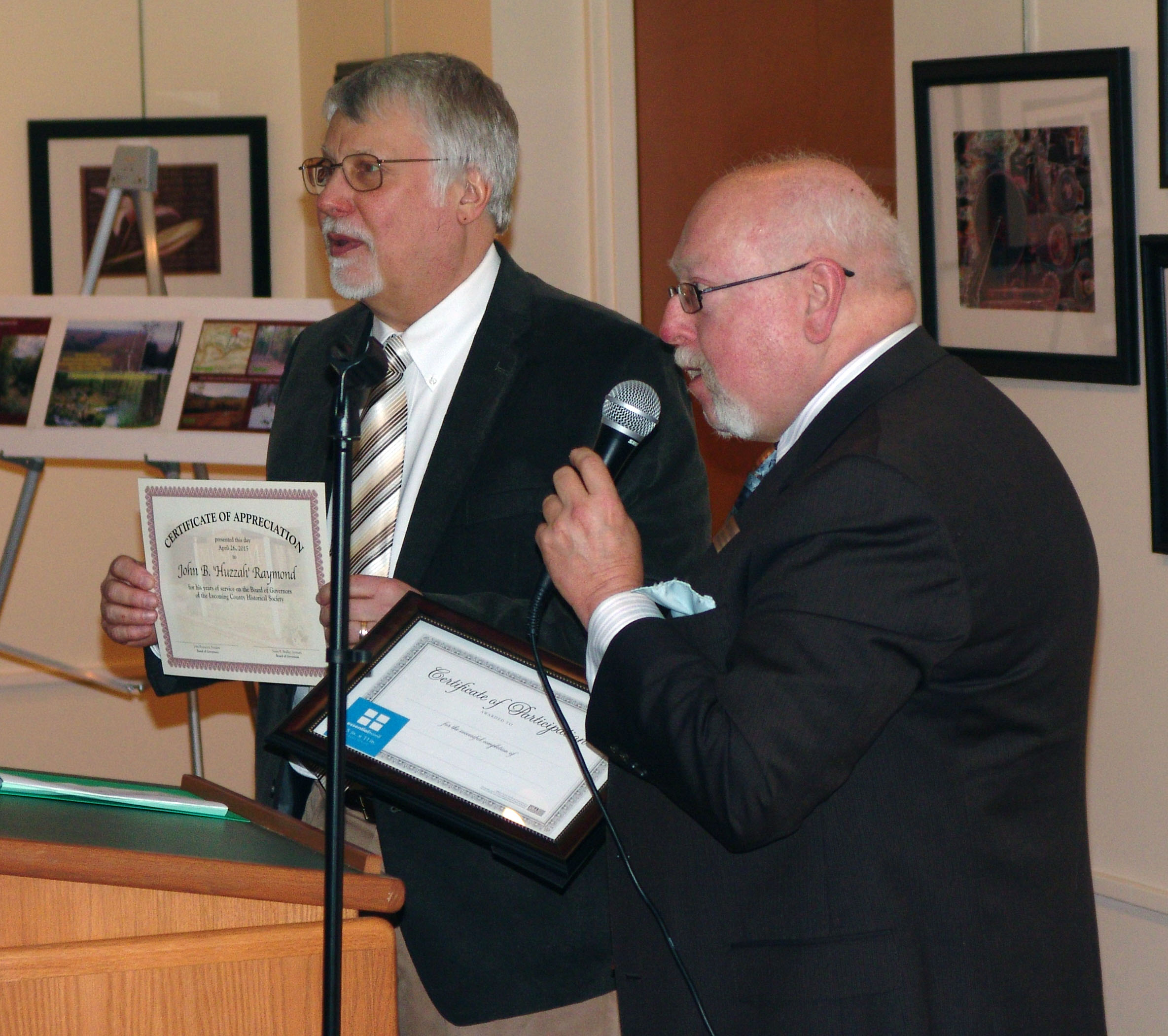 Director Gary Parks presented outgoing Board President John Raymond with a certificate of appreciation.